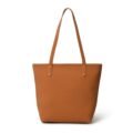 Front view of the bottom of a black leather tote bag, showcasing its sturdy and flat base, against a white background