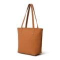 A Tan leather tote bag, showcasing its sturdy and flat base, against a white background