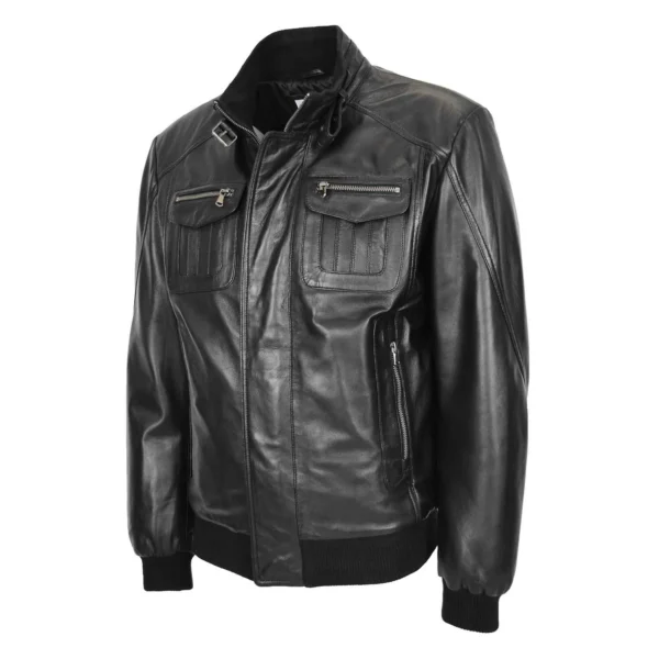 Front view of a black leather bomber jacket with ribbed waistband and cuffs, featuring a simple design and soft, smooth leather finish, displayed against a white background