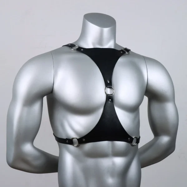 Front view of a mannequin wearing a black leather harness with adjustable straps and metal buckles, designed for a snug and supportive fit