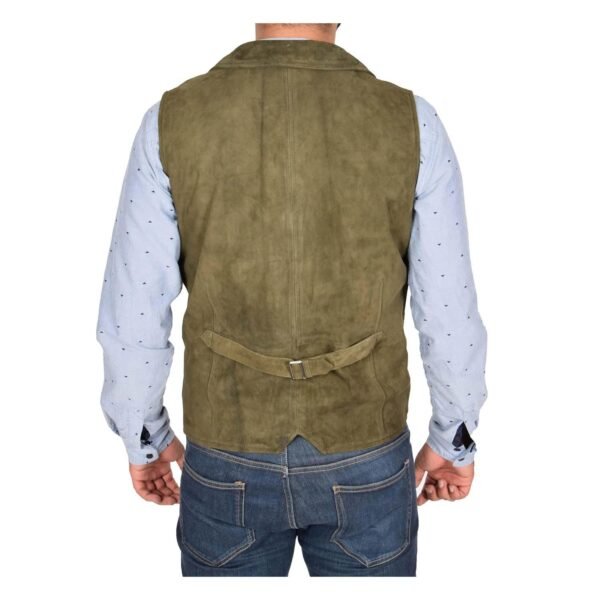 Back view of a model wearing a Men's Suede Button Fastening Waistcoat Devin Green with tan leather belt and dark blue jeans and blue dotted shirt under the vest