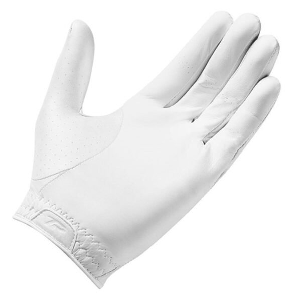 Angled view of White leather glove with a smooth palm and black accents along the inner side of the fingers, featuring reinforced stitching and an elasticated wrist for a secure fit