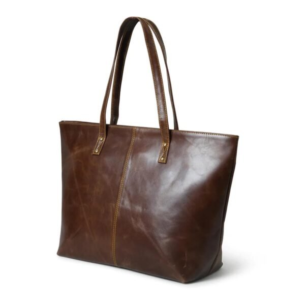 Dark Brown leather tote bag with sturdy handles and a smooth, polished finish, featuring visible stitching and a simple, elegant design