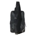Black leather sling backpack with a single adjustable strap, compact design, and multiple zippered compartments for easy organization rear view