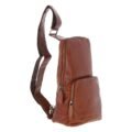 Tan leather sling backpack with a single adjustable strap, compact design, and multiple zippered compartments for easy organization side view with white background