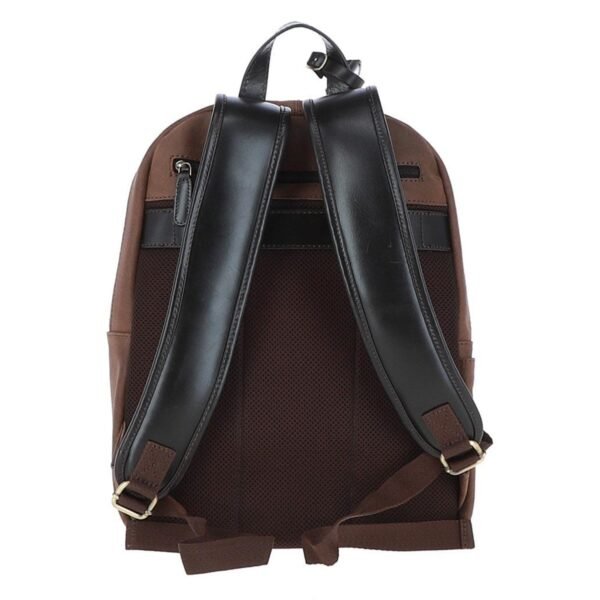 Rear view of a brown canvas and leather backpack featuring multiple zippered pockets, a reinforced bottom, and a sturdy leather top handle for durability