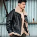 A model wearing a Real Sheep Skin Men’s MF7 Leather Bomber Jacket